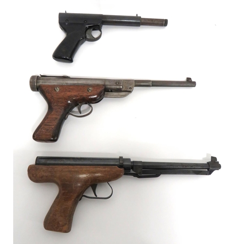 399 - Three Various Air Pistols
.22, 7 1/2 inch, blackened, fixed barrel.  Front blade sight.  Lower loadi... 