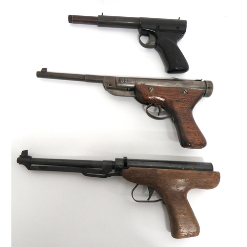 399 - Three Various Air Pistols
.22, 7 1/2 inch, blackened, fixed barrel.  Front blade sight.  Lower loadi... 