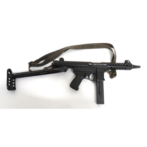 402 - Deactivated Spanish 2-70 B Sub Machine Gun
9 mm, 8 inch barrel.  Tubular, vented barrel shroud ... 