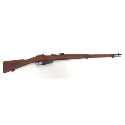 Deactivated Italian M38 Carcano Rifle
6.5 mm, 27 1/4 inch, blackened barrel.  Front blade sight and rear, hinged, adjustable sight.  Blackened breech.  Straight bolt handle.  Blackened steel trigger guard and magazine body.  Polished, full stock woodwork and top hand guard.  Blackened steel butt plate, barrel bands and clearing rod.  Complete with current cert.  