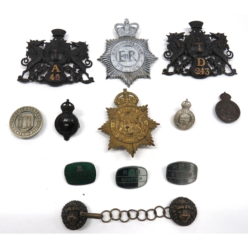 12 x Police Helmet And Cap Badges
including blackened and brass City Of London helmet plate ... Chrome QC Metropolitan Police helmet plate ... Brass KC South African Police helmet plate ... White metal KC St Lucia Police Force ... Blackened KC West Riding Constabulary (centre absent) ... White metal Northumberland Constabulary ... Bronzed KC Metropolitan Special Constabulary lapel badge.  12 items.