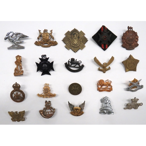 90 - 20 x African Cap Badges
including blackened QC Royal Rhodesia Reg with backing felt ... Brass Wester... 