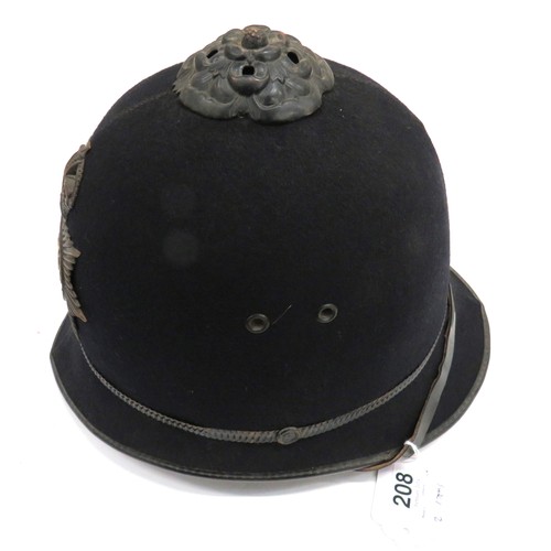 208 - Metropolitan Police Helmet And Military Cap
black, two panel crown.  Pointed peak and rounded rear b... 