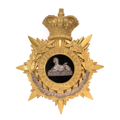 Badge. South Lancashire Regiment Victorian Officer's helmet plate circa 1881-1901. Fine scarce rich gilt crowned star mounted with Garter and laurel sprays bearing silver scroll SOUTH LANCASHIRE REGIMENT. Black velvet centre with silver Sphinx on EGYPT plinth. Three loops. VGC