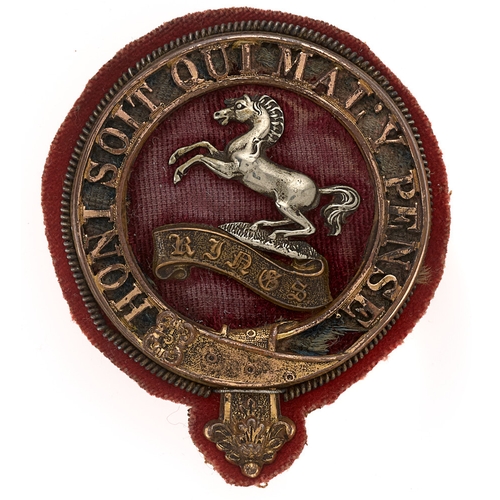 King's Liverpool Regiment Victorian Officer's post 1881 forage cap badge.  Good scarce gilt pierced Garter on a blue velvet; crimson velvet domed centre bearing the White Horse in silver on gilt scroll KINGS in Old English script.     Loops.  Toned, pile to velvet worn. GC