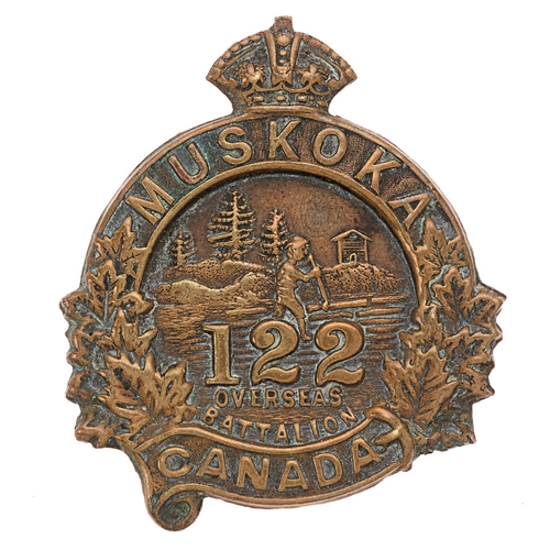 Canadian 122nd (Muskoka) Bn. CEF WW1 cap badge.  Good scarce die-stamped bronze crowned strap MUSKOVA CANADA strap; forest scene with 222 OVERSEAS BATTALION to centre.    Flat loops.  GC
