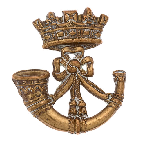 Duke of Cornwall's Light Infantry Victorian cap badge circa 1896-1900.   Good scarce die-stamped brass Ducal coronet over strung bugle.    Three toned loops.  VGC