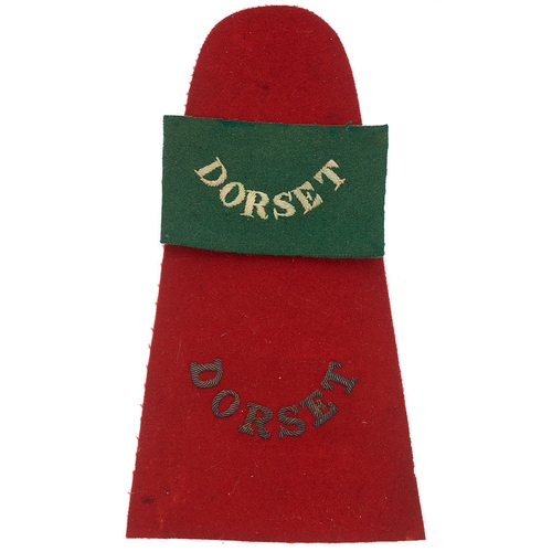 Dorsetshire Regiment pagri badge and senior shoulder strap.  Good scarce curved white serif DORSET embroidered on green rectangle ... gold wire serif  DORSET embroidered on superior quality scarlet cloth (possibly intended for pagri use)).