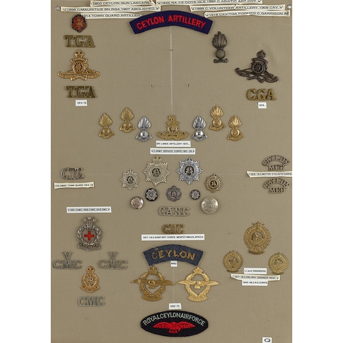 282 - Ceylon Military approx. 41 badges etc.  Board with good display of metal and cloth badges, collars, ... 