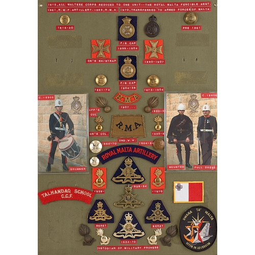 283 - Malta Artillery approx. 33 badges etc.  Board with good display of metal and cloth badges, collars, ... 