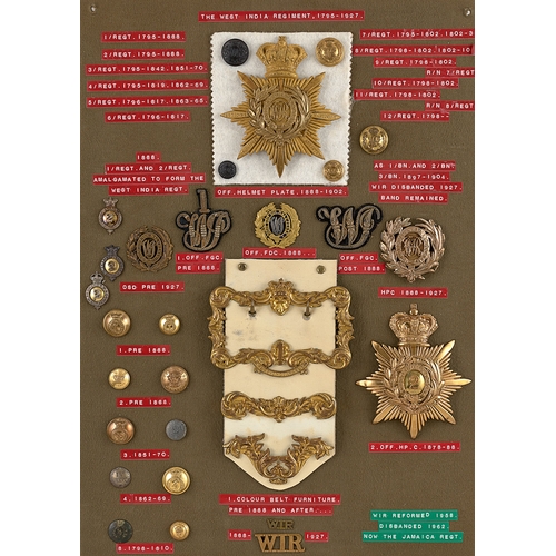 288 - West India Regiment approx. 28 badges etc.  Board with good display of metal and cloth badges, colla... 