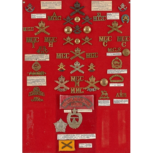 292 - Machine Gun Corps and  MMG approx. 49 badges etc.  Board with good display of metal and cloth badges... 