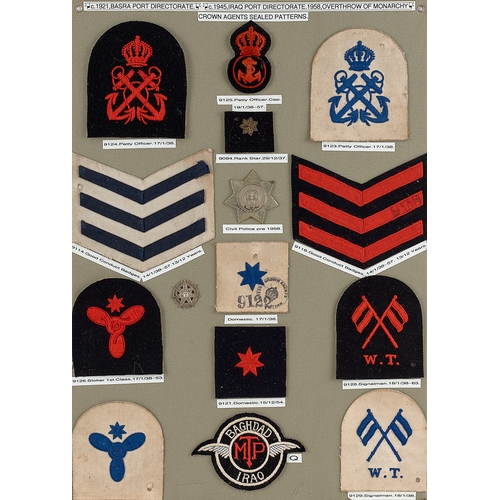 297 - Iraq approx. 15 naval and police badges etc.  Board with good display of metal and cloth badges. Mos... 