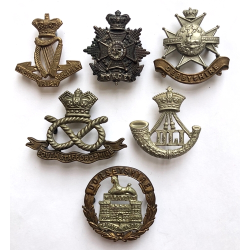 305 - 6 Victorian Infantry cap badges.  Royal Irish ... Border ... Derbyshire ... South Stafford ... Durha... 