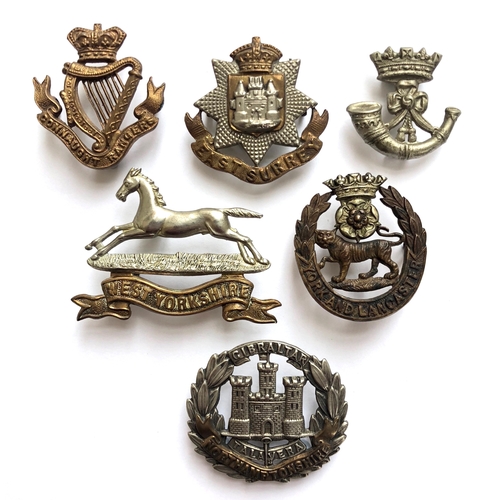 308 - 6 Victorian/Edwardian Infantry cap badges.  Connaught Rangers ... East Surrey ...  Duke of Cornwall'... 