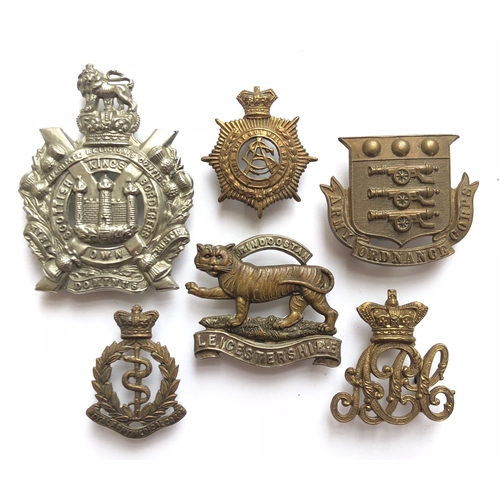 6 Victorian/Edwardian cap badges.  King's Own Scottish Borderers ... Army Service Corps ... Army Ordnance Corps ... Army Pay corps ... Royal Army Medical Corps ... Leicestershire. All complete with loops.
