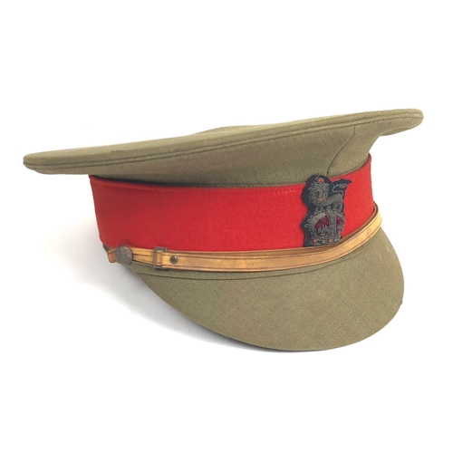 WW1 Attributed Staff Officer's Cap.  A very good example tailored by Tress & Co of London and retailed through Silvio Sesti of Cairo. A regulation pattern example with bullion Royal Crest badge mounted onto a scarlet band. Complete with thin leather chinstrap and to the interior the sweatband and lining of leather. The latter with gold tooled tailors details. Pencil name of "CAPT H. J. BUTCHART". VGC.        Attributed to Lt. Col. H.J. Butchart DSO., TD., JP. Who in 1939 was listed  as a representative of the TA Association University of Aberdeen.