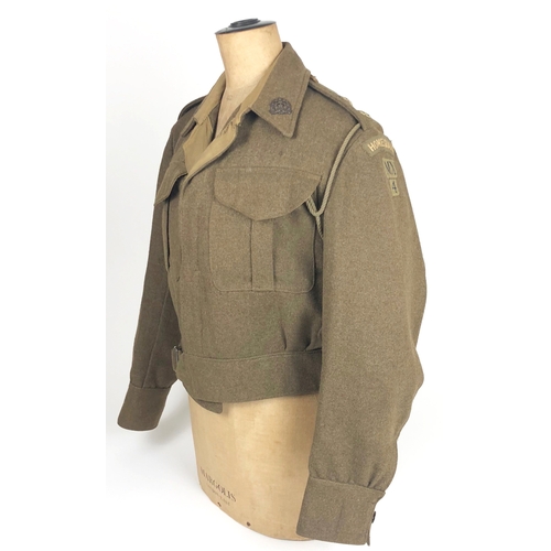 Middlesex Home Guard Harlington WW2 Officer's Battledress Blouse  A good original example of a 1937 pattern blouse with issue label dated 1940. To each sleeve Home Guard embroidered titles. Printed MX 4. The collar with OSD Middlesex Regiment collar badges, Lieutenant rank stars to the straps and ink details "4685 FF". Good clean condition.