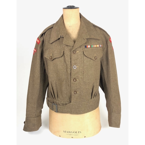 Berkshire 2nd Period Home Guard Officer's Battledress Blouse.  A scarce original badged example, comprising: 1940 Pattern blouse the label stating Size 12 1944 and ink name Captain R R. Retaining original Badges: Major rank crowns, Home Guard and Berkshire 2. The left breast with meal ribbons 1939/45 Star, Pacific Star, Defence Medal, War Mdal. Good clean condition. No moth damage.