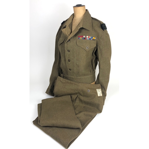 British War Correspondent WW2 Battledress Uniform.  A good clean example of a 1940 pattern battledress uniform beleaved worn by a  British War Correspondent.
Comprising: Blouse retaining slip on gold bullion embroidered onto green shoulder tittles. Medal ribbons to the left breast of: CBE, MC**, 1914 Star, British War Medal, Victory Medal, MID, 1939/45 Star, 1937 Coronation Medal, MID. The inside with issue label indicating Size 15 November 1942.
Trousers tailored with both field dressing and large leg pocket. Label indicating Size 12 1943.
Very good clean condition.
(2 items)        Bosleys have been unable to attribute this uniform.