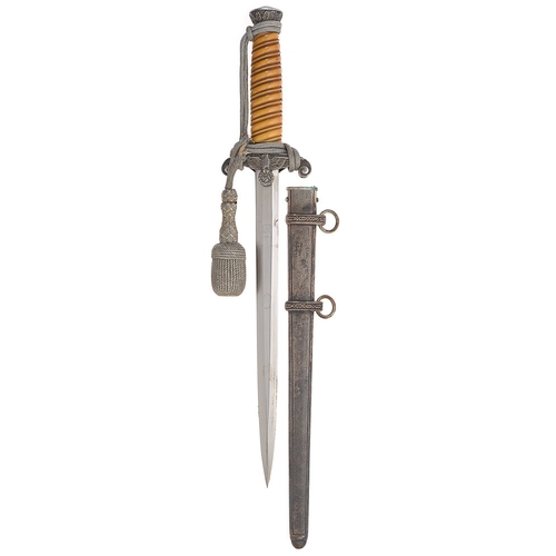 German Third Reich Army Officer's Dagger with knot by Ernst Pack & Sohne, Solingen.  Good example circa 1935-45 with amber spiral celluloid grip and plain polished double-edged blade etched with Siegfried Waffen Ernst Pack & Sohne MBH Waffenfabrik Solingen dancer logo. Plated eagle and swastika cross-guard, oak leaf decoration to pommel and ferrule. Housed in stippled plated scabbard with two suspension rings and foliate lockets. Complete with rather worn aluminium wire portepee (knot). Minor service wear and toned but generally GC.        Army (Heer) Officer’s dagger was designed by Paul Casburg in 1935.