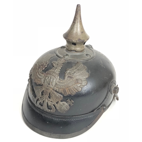 443 - Imperial German Prussian State WW1 Pickelhaube  A good example polished black leather skull, with gr... 