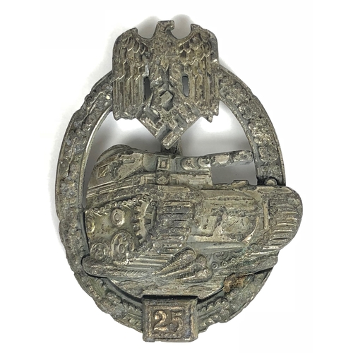 German Third Reich SS / Army WW2 Tank Assault breast badge for 25 Engagements by JFS.  Excavated rare die-cast example. Approaching panzer secured with two open rivets within an oval oakleaf wreath surmounted by eagle and swastika with applied 25 tablet to base. Reverse with hinged vertical tapered pin and countersunk hook; Josef Felix & Sohne, Gablonz logo. Slight service wear. VGC        Basic badge instituted 20th December 1939; 22nd June 1943 numbered version introduced.