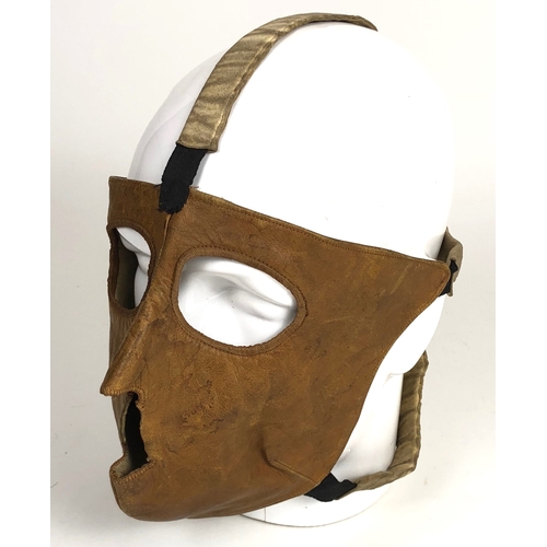 475 - WW1 Aviator’s face mask.  A rare example of  a private purchase face mask, made of soft brown leathe... 