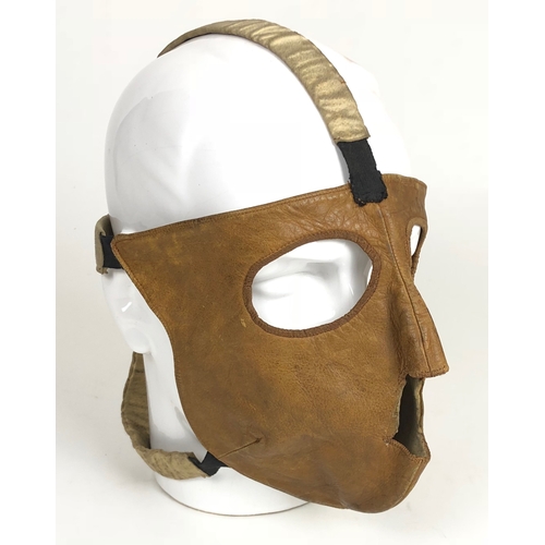 475 - WW1 Aviator’s face mask.  A rare example of  a private purchase face mask, made of soft brown leathe... 