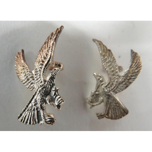 133 - Box Of Ghana Eagle Rank Badges
plated eagles in flight pairs.  Rear lug fixing.  Contained... 