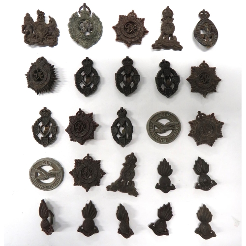 135 - 25 x WW2 Plastic Economy Corps Cap Badges
including KC Pioneer Corps ... KC General List ... KC Roya... 