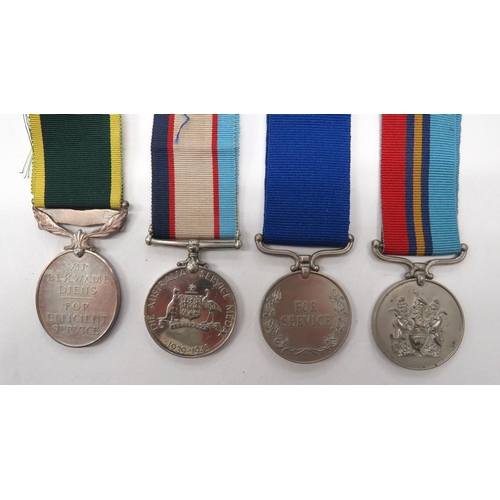 152 - Four Various Commonwealth/Overseas Medals
consisting GRVI Union Of South Africa Efficiency medal. &n... 