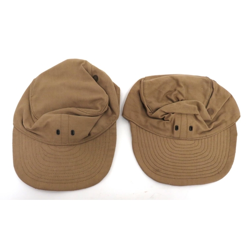 181 - Two WW2 Dated British Combat Caps
khaki cotton crown with side vents and front badge holes.  La... 