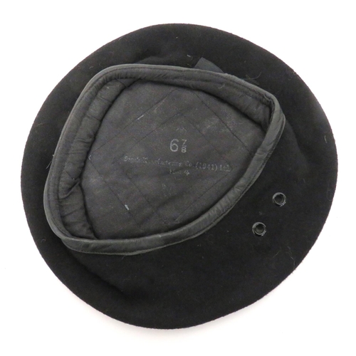 WW2 Dated Black Beret
black woollen beret.  Lower black leather sweatband.  Large side vent holes.  Cotton lining dated 1944.  Clean condition.