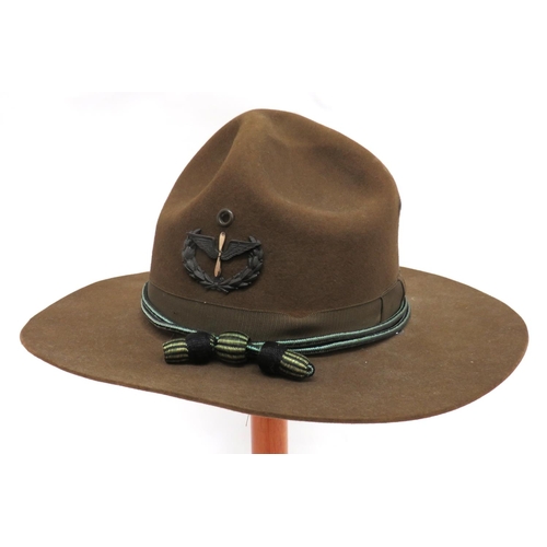 200 - American Aviation Corps Overseas Felt Hat
khaki green felt, lemon squeezer shape crown.  Lower,... 