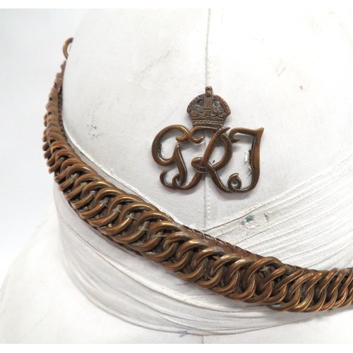 203 - Early 20th Century Indian Solar Topee Pith Helmet
white blancoed, six panel crown, pointed front pea... 