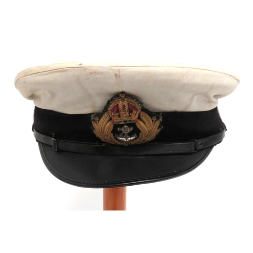 205 - Post 1901 Royal Navy Officer's Service Dress Cap
dark blue crown and body with white cotton, removab... 