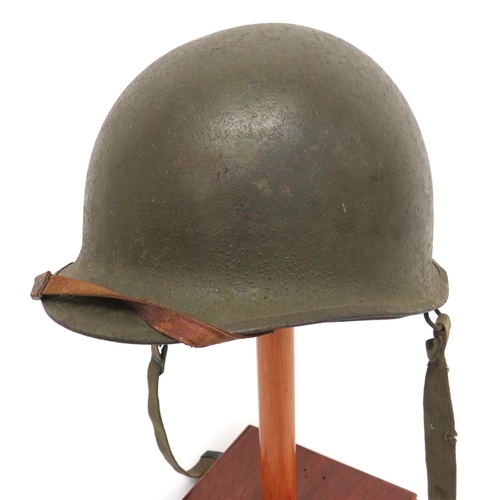 210 - American WW2 Pattern Steel Helmet And Liner
green painted, rough texture, outer shell.  Lower b... 