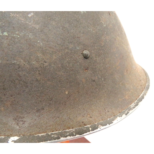 211 - British MKIII Turtle Pattern Steel Helmet
brown painted, rough texture shell.  High side rivets hold... 