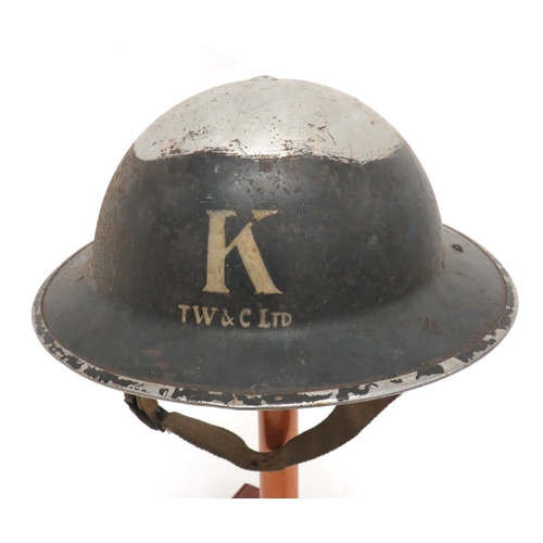 212 - WW2 Home Front Civil Defence Factory Steel Helmet
black painted outer shell.  The front stencilled 