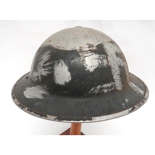 212 - WW2 Home Front Civil Defence Factory Steel Helmet
black painted outer shell.  The front stencilled 