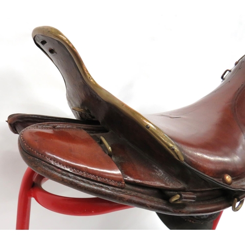 215 - 1891/98 Pattern Cavalry Saddle
leather seat with brass edged front and rear spoon.  Brass secur... 