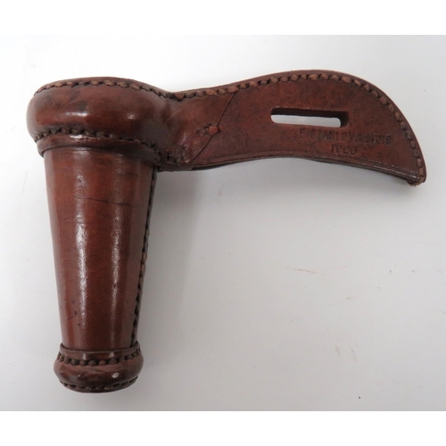 1900 Dated Boer War Period Lance Stirrup Boot
polished, brown leather, small, conical lance holder.  Leather mount to secure over a stirrup.  Maker stamp "E Stanley & Sons 1900".  