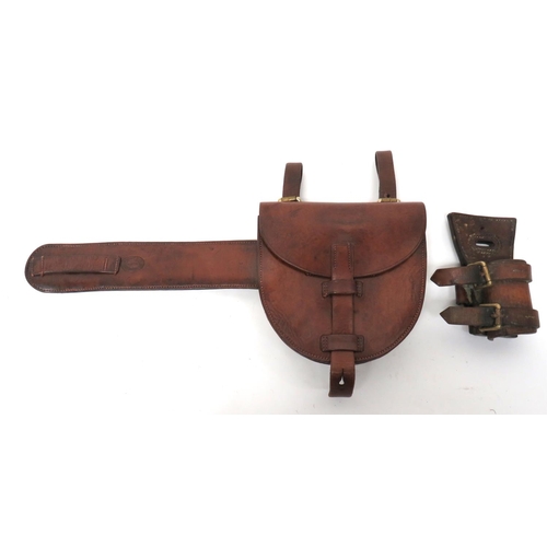 225 - Cavalry Horseshoe Case And Separate Sword Frog
half, oval leather case.  The top flap secured by a l... 