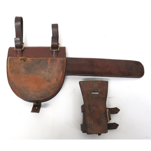 225 - Cavalry Horseshoe Case And Separate Sword Frog
half, oval leather case.  The top flap secured by a l... 