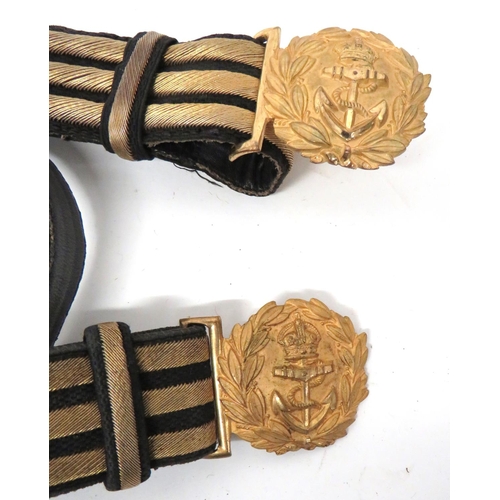 233 - Two Royal Navy Officer Sword Belts
black braid facing with three gilt embroidery lines.  Black ... 