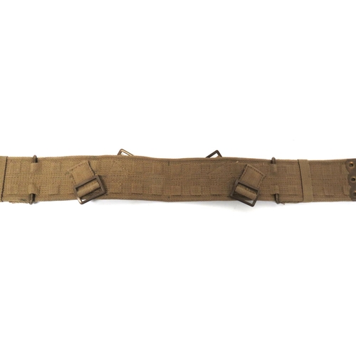 257 - Unusual 1937 Pattern Webbing Belt
khaki webbing, three section belt.  The rear panel with exter... 