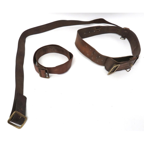 262 - 2 x 1903 Pattern/Home Guard Leather Belts
brown leather belts with brass buckles.  One belt wit... 