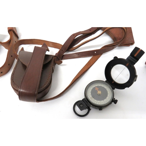 264 - Two Various Holsters
consisting WW2 leather, flare pistol holster.  Rear belt strap and side fi... 