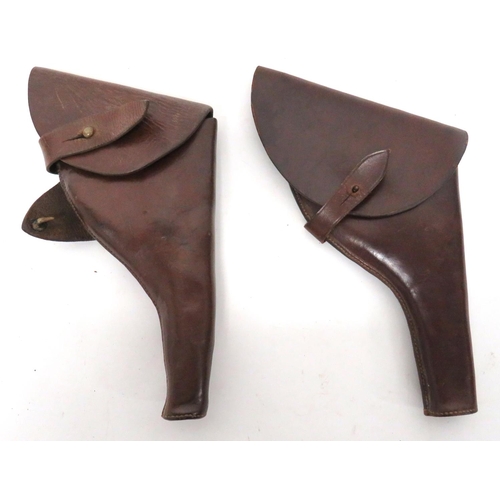 272 - Two WW1 Pattern Officer Revolver Leather Holster
consisting brown leather example.  Top flap se... 